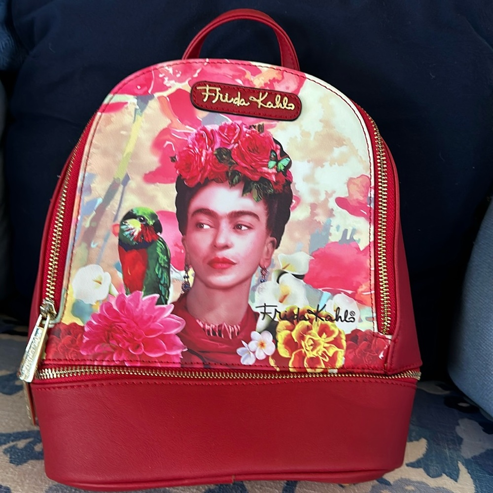 Stylish Frida Lahlo backpack purse. Brand new- never used.